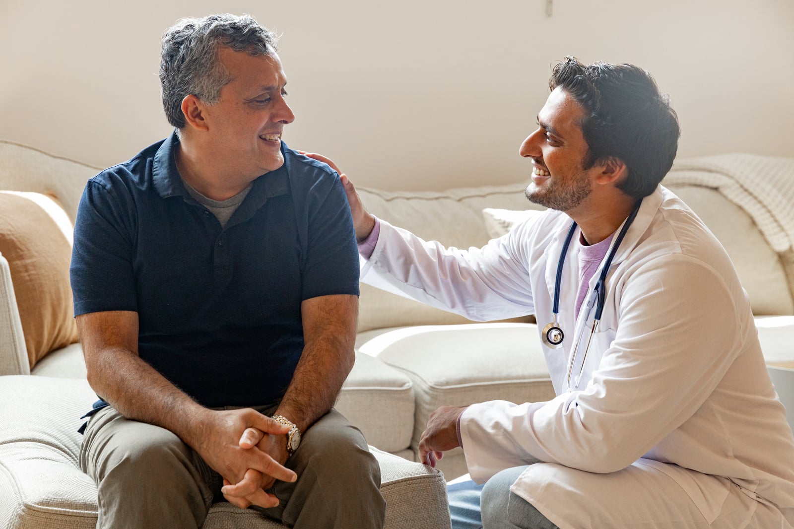 Doctor consulting a patient about hearing health