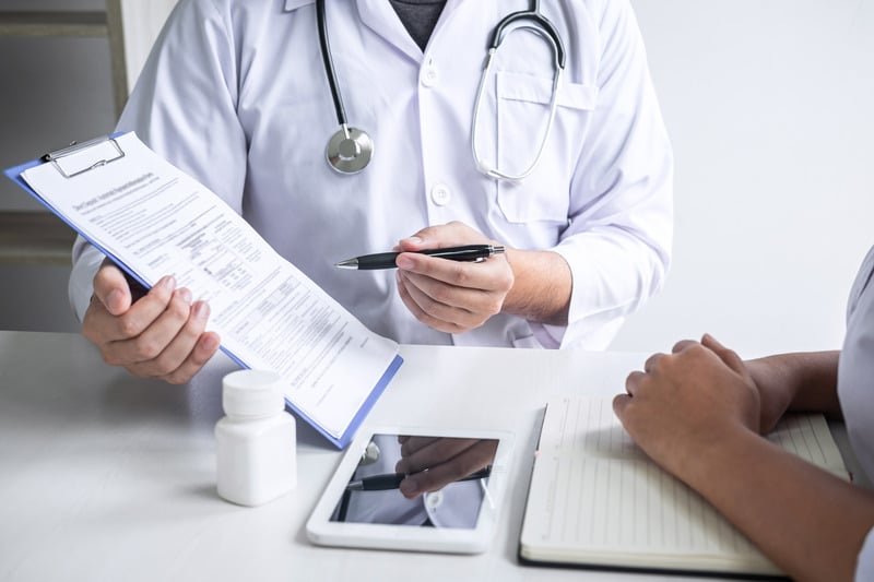 Doctor reviewing patient notes